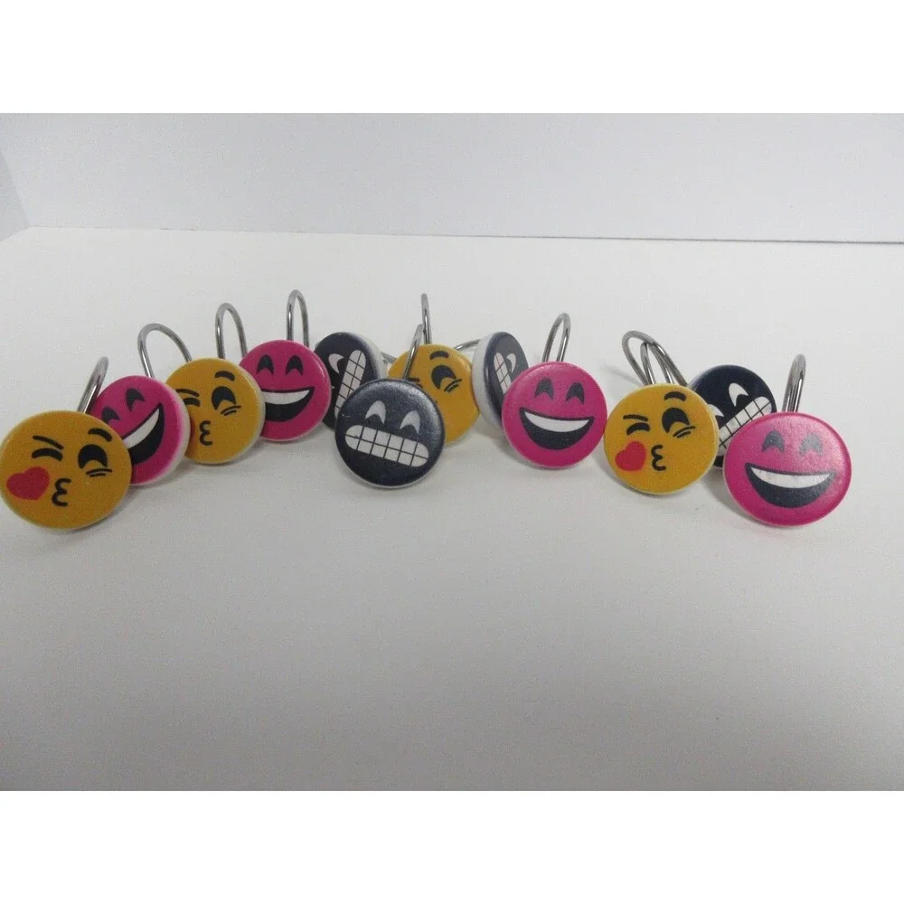 set of 12 emoji shower hooks, three different faces